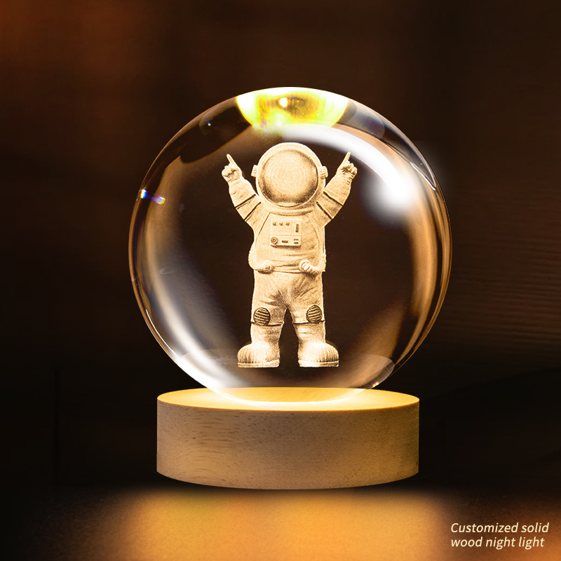 Crystal ball little astronaut