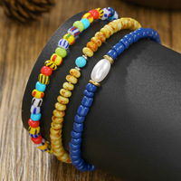 Bracelet extensible style bohème perles de riz, design Instagram, design color-block de niche, à porter en superposition, perles unisexe