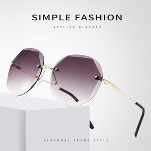 Lunettes de soleil rondes sans monture, style moderne, métalliques, anti-UV, pour femmes, idéales pour les voyages et la plage. - Product Image 2