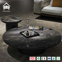 Table basse moderne en marbre rond avec base en piédestal noir, table centrale personnalisée, solution tout-en-un pour le mobilier de salon