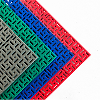 Dalles de sol modulaires en PP à emboîtement antidérapantes et écologiques pour terrains de sport (basketball et volley-ball) en extérieur