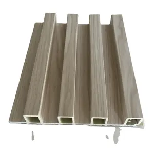 Paneles de madera de nogal panel interior grano de madera PVC WPC paneles de pared