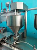 Nieuwe broodsnij- en vulmachine voor room, jam, maïs & ei - broodsnijmachine, eenvoudig te bedienen voor gebruik in bakkerijen