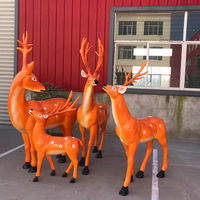 Statue de renne de Noël personnalisée en fibre de verre, décorations de Noël éclairées par LED, sculpture en FRP pour l'entrée d'un centre commercial