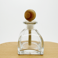 Bouteille diffuseur de parfum en verre transparent de 50 ml de la marque chinoise ZY, avec bouchon en silicone et opercule en liège, sérigraphiée pour l'aromathérapie