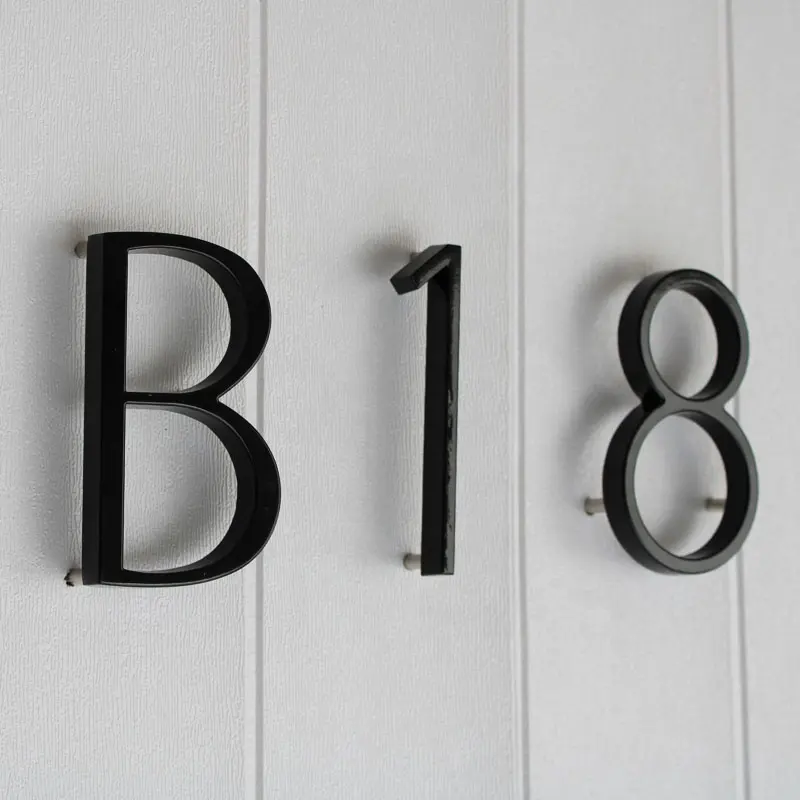 หมายเลขประตูที่ทันสมัยลอยบ้านจำนวนตัวอักษร5นิ้ว (125มม.) ป้ายโลหะผสมสังกะสีสีดำสำหรับโรงแรมพาร์ทเมนท์