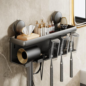 Soporte multifuncional para secador de pelo con ventosa, estante de pared para baño con vasos para cepillos de dientes y bandeja de almacenamiento, montaje en esquina - Product Image 1