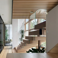 Escalier flottant en spirale moderne BOSI BI-L001 en acier au carbone avec marches en bois massif, pour salon, avec poutre de support, finition thermolaquée