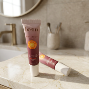 บีม ราวี ทินท์เต็ด บาล์ม SPF 30 โกโก้ บัตเตอร์ หลอดพลาสติกแบบยืดหยุ่นพร้อมฝาลิปสติก หัวแปรงพลาสติกสำหรับทาครีมบำรุงรอบดวงตา - Product Image 3