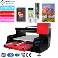 Impresora UV DTF de Cama Plana Refinecolor de Amplia Aplicación 6090 para Imprimir en Vasos, Pelotas de Golf, Baterías Portátiles, Lienzos, Acrílico y Pegatinas