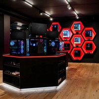 Vitrine d'exposition moderne personnalisée en acier inoxydable et verre, éco-responsable, avec éclairage LED pour magasin de jeux informatiques et commerce de détail