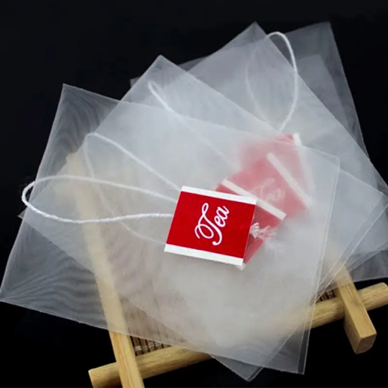 Bolsas de té de alta calidad, embalaje de bolsas de té pirámide, malla de nailon con etiqueta y cadena