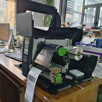 Pita Transfer Termal UC169 untuk Printer Zebra TSC Godex Datamax 300m X 50-110mm Pita Barcode dengan Kehitaman Tinggi yang Ditingkatkan.
