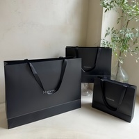 Sac de shopping en papier couché personnalisé pour le commerce de détail, sac cadeau de luxe avec poignées, emballage imprimé avec logos