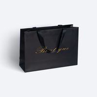 Design personnalisé emballage de vêtements de luxe 250 g/m² sac en papier d'art pour vêtements