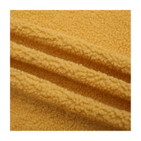 Tissu polaire Sherpa populaire pour l'automne et l'hiver Imitation laine d'agneau tissu recyclé en peluche pour vêtement de veste