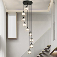 Lustre long pour escalier, luminaire de luxe en fer forgé, style nordique simple et moderne, pour villa, pavillon, restaurant rotatif, LED central
