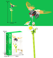 Modèle d'insectes libellule, papillon, coccinelle, fleur en briques, blocs de construction pour la décoration de table