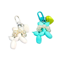 En gros, Breloques et accessoires de porte-clés en résine 3D, motifs dessin animé, jouets mignons style anime, chien ballon, légers et tendance, pour sacs de filles et femmes