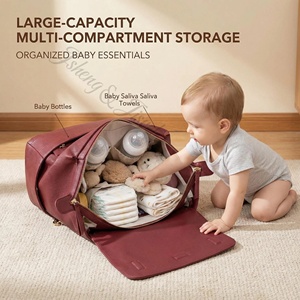 Sac à langer de luxe en cuir véritable résistant à l'eau |   Sac de maternité bordeaux compatible poussette avec pochette de rangement amovible - Product Image 1