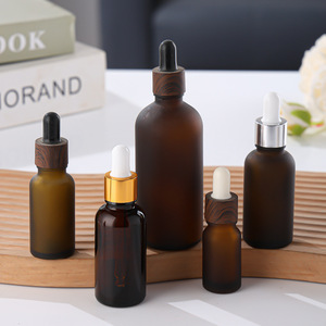 5ml 10ml 15ml 20ml 30ml 50ml <strong>Glass</strong> Frosted <strong>Amber</strong> Essential Oil Eye Liquid <strong>Bottle</strong> with Dark Brown Wood Grain Dropper Cap - Product Image 6