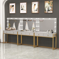 Table de maquillage moderne de qualité professionnelle avec miroir éclairé durable pour les boutiques de robes de mariée, les salons de beauté, les appartements