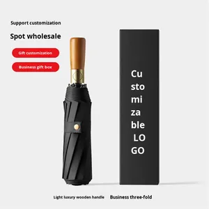 Manche en bois <span class=keywords><strong>Parapluie</strong></span> <span class=keywords><strong>pliant</strong></span> d'affaires <span class=keywords><strong>haut</strong></span> <span class=keywords><strong>de</strong></span> <span class=keywords><strong>gamme</strong></span> pour hommes 10 côtes Tube <span class=keywords><strong>de</strong></span> fer entièrement automatique 105cm Diamètre ouvert Revêtement noir - Product Image 5