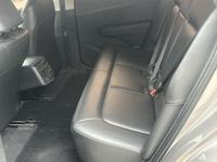 TOYOTA BZ3 2024 ELITE PRO EDITION d'occasion, berline 4 portes 5 places, électrique pur, autonomie 517 km, avec toit ouvrant, argent sur gris, 200 000 km