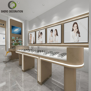 <span class=keywords><strong>Service</strong></span> de conception de mobilier sur mesure pour l'aménagement intérieur de boutiques d'optique haut de gamme et l'exposition de lunettes de soleil - Product Image 4