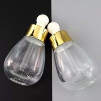Flacons compte-gouttes en verre de 30 ml pour usine cosmétique, formes ovales ampoule, marron, noir, bleu, avec compte-gouttes dorés ou argentés pour huile capillaire et sérum