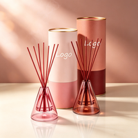 Diffuseur de parfum de luxe en gros, nouveau diffuseur d'ambiance avec bouteille décorative en verre artistique et bâtonnets en rotin OEM