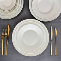Assiettes plates jetables écologiques en céramique de porcelaine blanche pure de 10,5 pouces, grand format, prix de gros abordable pour hôtels