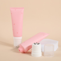 Tube multifonctionnel de compression de maquillage 100g120g avec interrupteur rotatif de tête de massage à 5 boules en alliage de zinc pour les soins du corps nettoyant