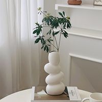 Vase en céramique de luxe moderne pour décoration d'intérieur Vase de table en forme de galets pour mariage