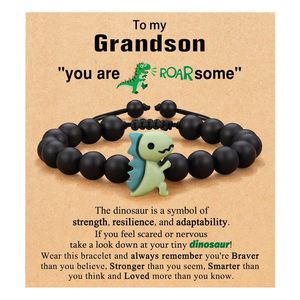สร้อยข้อมือไดโนเสาร์สำหรับเด็ก<span class=keywords><strong>แบ</strong></span>บยูนิเซ็กซ์ สีเขียวประดับด้วยหินดงหลิง ปรับขนาดได้ สีดำด้าน ลายการ์ตูน ทำจากเรซิ่นแบบถัก - Product Image 5