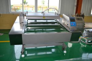 Osetra ปลาแซลมอนสเต็กเนื้อปูราชา ซาร่า ประสิทธิภาพสูงเอียงได้ สายพานลําเลียงสูญญากาศแบบต่อเนื่อง เครื่องบรรจุสูญญากาศแบบสายพาน - Product Image 4