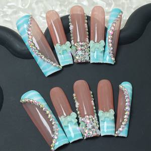 Uñas postizas de acrílico de lujo, cortas, color rosa almendra, cobertura completa, hechas a mano, con pedrería de estrellas, precio de fábrica, venta al por mayor. - Product Image 2