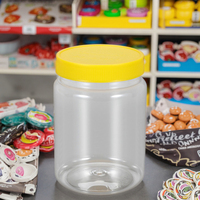 Récipient transparent en plastique PET de 1 litre pot rond à beurre d'arachide avec couvercle à vis pour emballage de bonbons