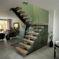 Escalier intérieur flottant moderne en U avec marches en bois massif, garde-corps en verre, monopoutre, forme et taille personnalisées