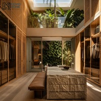 Dressing moderne tropical en bois à lames orientables avec portes en verre transparent et îlot de rangement en granit monolithique pour suite de villa