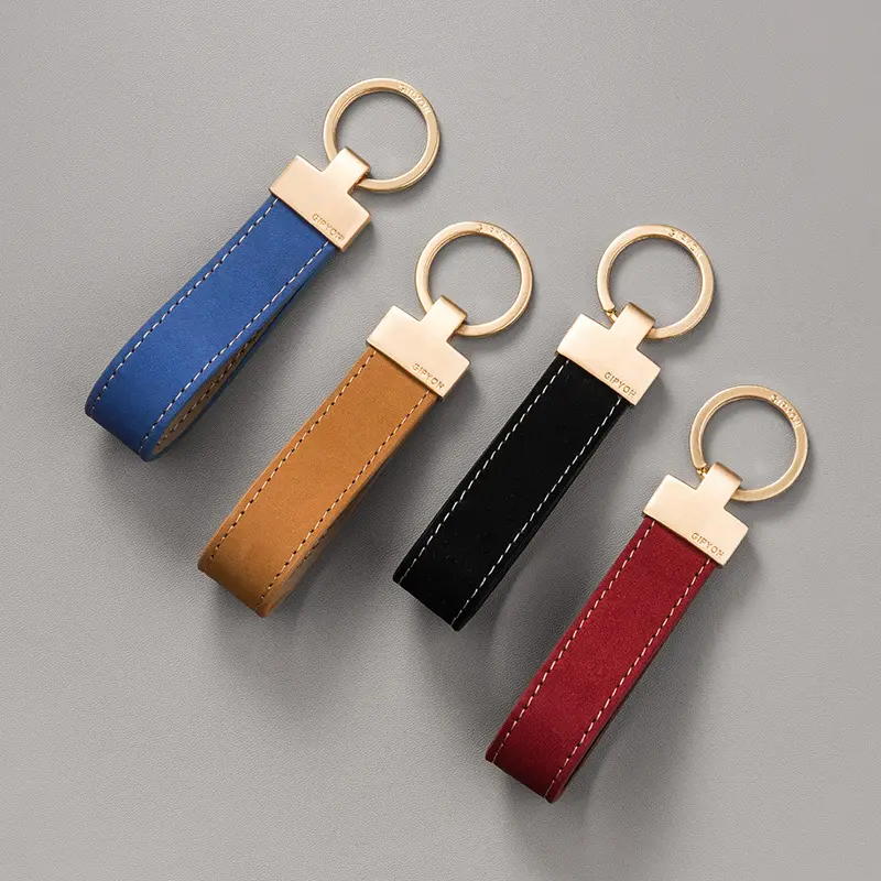 Porte-clés en cuir Accessoires de porte-clés en gros Porte-clés en cuir de qualité supérieure de luxe véritable Porte-clés en cuir avec logo de marque personnalisé