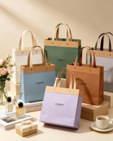Sac fourre-tout écologique fait main et recyclable à fond carré tridimensionnel avec poignée en cuir simple, sac cadeau en papier