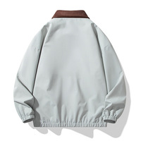 Veste coupe-vent OEM décontractée pour hommes de 100 grammes en toile avec ourlet élastique et col tournant de couleur contrastée pour le printemps logo personnalisé