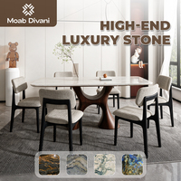 Table à manger rectangulaire moderne en marbre avec base en bois massif en forme de papillon, cadre noir, ensemble de chaises en tissu lin