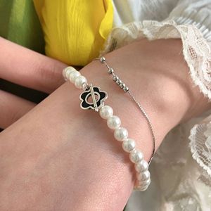 สร้อยข้อมือมุกเงินแท้ S925 พร้อมหัวเข็มขัดรูปดอกไม้สำหรับผู้หญิงสวมใส่ทุกวัน - Product Image 1