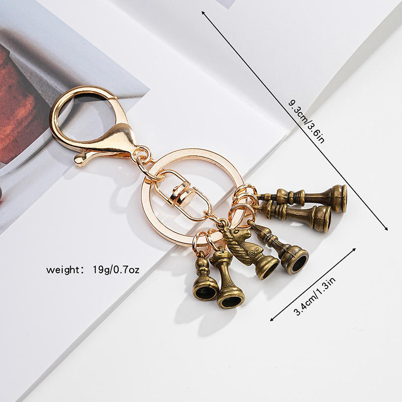 Chess keychain gold