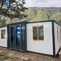 Maison conteneur moderne extensible prête à l'emploi 2025, panneau sandwich, conception spacieuse pour atelier ou utilisation en parc, garantie 4 ans