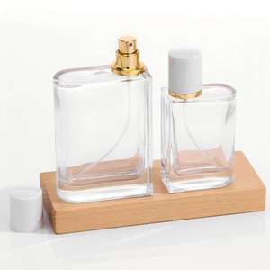 Envase de Perfume Rectangular Transparente de Vidrio LK Packaging con Tapa Dorada y Pulverizador, 25 ml, Envase de Muestra Cosmética con Serigrafía - Product Image 1