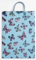 Kit d'emballage cadeau recyclable personnalisé avec motif papillon bleu pastel, comprenant du papier d'emballage pour bouquet, un sac en papier de Noël et un rouleau de papier d'emballage