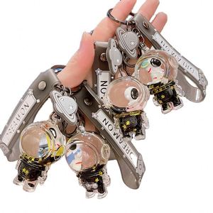 Creative Cartoon Floating Astronaut <b>Key</b> <b>Chain</b> Floating Sand Float Bottle Bag Pendant Accessories Liquid <b>Key</b> Ring Gift - Product Image 1